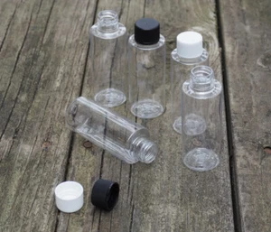 2 Oz. Plastic Clear Cylinder Bottles with white ribbed cap Travel size 10 PACK - Picture 1 of 2