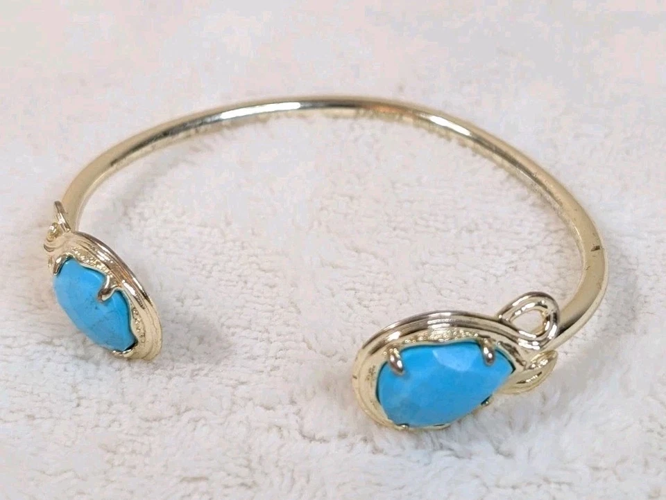 Brazalete abierto Kendra Scott tono dorado piedras azul turquesa para mujer’s Foto 1 de 4