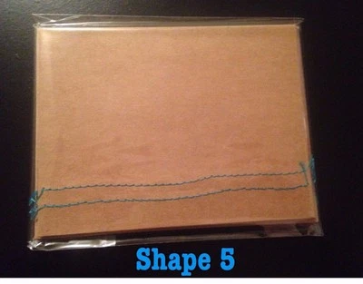 Variedad de estilos roba tarjetas de felicitación marrón en blanco y sobres Foto 1 de 2