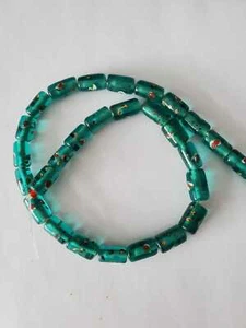 29 Bead, lampworked glass, dark teal green and multicolored,13x8mm-16x10mm - Picture 1 of 2