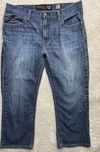Pantalones de mezclilla Ariat corte bota resistentes al fuego FR M4 Cat2 ropa de trabajo relajada para hombre 36X30 - Imagen 1 de 9