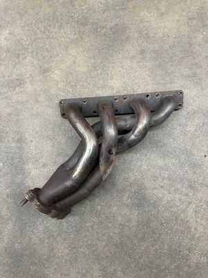 Colector de escape BMW M42 M44 4 cilindros 1990-1996 E30 E36 Z3 1,9 L 318i 318is OEM USADO Foto 1 de 4