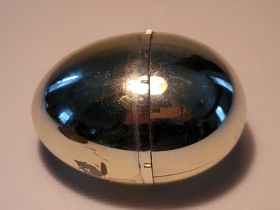 Vintage 1970s GOLD L’Egg pantyhose container Plastic Golden Egg small crack - Image 1 of 4