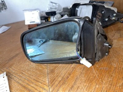 Espejo retrovisor lateral izquierdo Nissan Máxima 1989. Negro  Foto 1 de 3