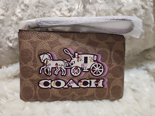 ?Polsino con zip angolare stampa cavallo e carrozza in tela firmato Coach?