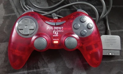 Mando InterAct Dual Impact Gamepad Colores PS1 PlayStation 1 Rojo Transparente Foto 1 de 2