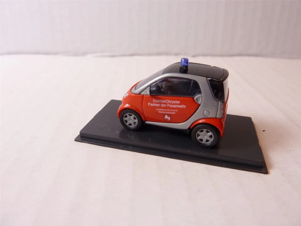 Busch Smart 489309 1/87 City Coupe vigili del fuoco Bassa Sassonia auto auto ... - Immagine 1 di 4