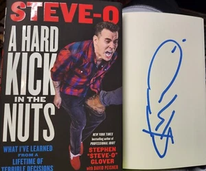 STEVE-O SIGNED Book A Hard Kick in the Nuts AUTOGRAPHED MTV JACKASS AUTOGRAPH - Picture 1 of 1