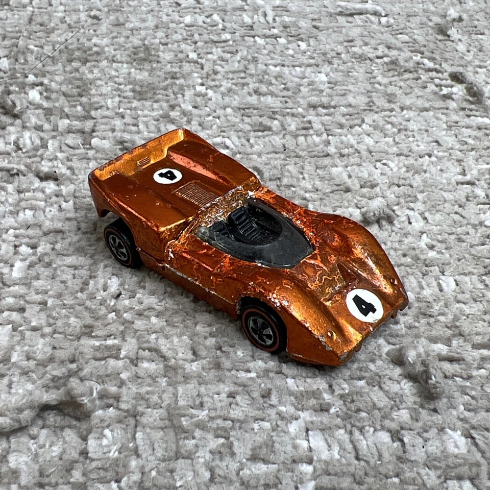 Hot Wheels Redline 1969 Mclaren M6A Metallic Orange - Image 1 of 4