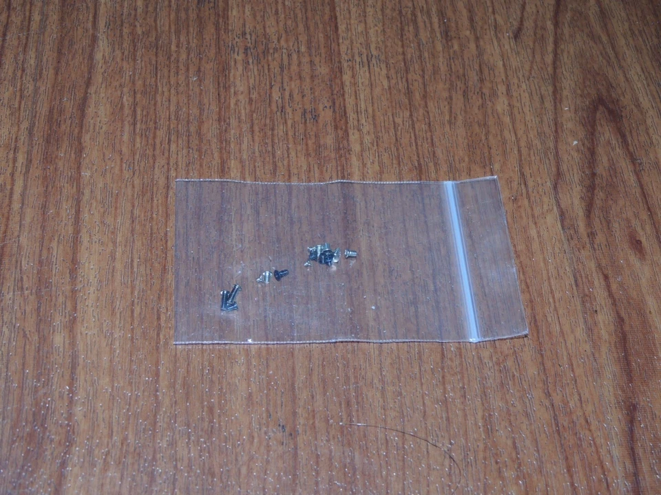 Juego de tornillos originales OEM originales para Canon PowerShot SD960 Foto 1 de 1