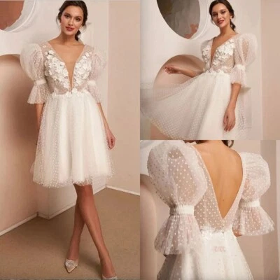 Vestidos de novia boho línea A cuello en V media manga encaje floral cortos vestidos de novia Foto 1 de 4