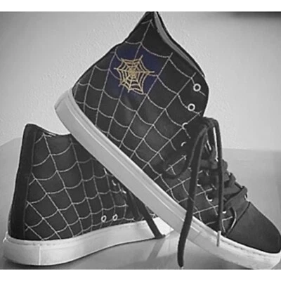 Zapatillas altas CHARLOTTE OLYMPIA negras, doradas web con caja 10 Foto 1 de 4