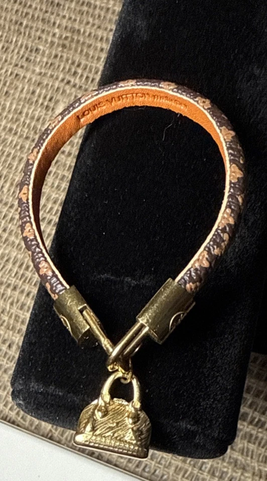 Pulsera LOUIS VUITTON Alma Marrón Lona Tono Dorado Dije - Poco Uso Foto 1 de 4