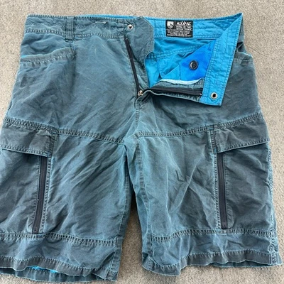 Pantalones Cortos Kuhl Para Hombres 36 Azul Pátina Tinte Carga Utilidad Bolsillos Viaje Senderismo Aire Libre Foto 1 de 4