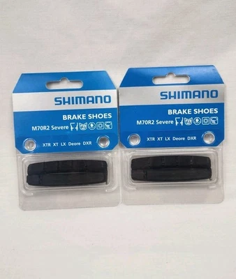 2 pares de insertos y pasadores de fijación de pastillas de cartucho de freno Shimano M70R2 en estado severo Foto 1 de 2