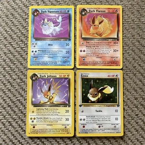 Team Rocket First Editon Eevee, Dark Vaporeon, Dark Flareon, Dark Jolteon - Picture 1 of 7