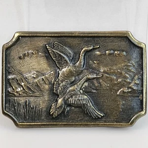 Fibbia per cintura vintage in ottone volante anatre oche canadesi anni 70 - Foto 1 di 5