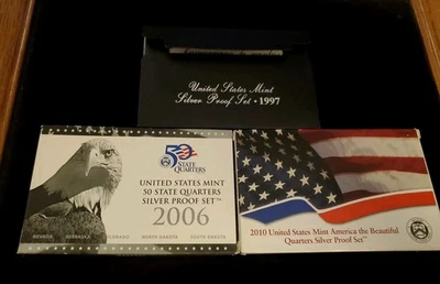 Silver Proof Lot 2010, 2006, 1997 Silver Set And AMERICA THE BEAUTIFUL  ONE Each - Image 1 of 4