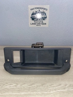 Bisel de palanca de escotilla Toyota Land Cruiser 1991-1997 con Handel gris OEM 69277-91701 Foto 1 de 4