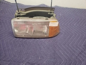 1995 GMC Jimmy headlight driver side - Picture 1 of 4