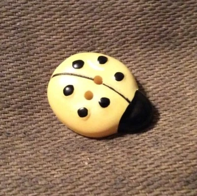 JHB BUTTONS  #24031 SPOTTED LADIES-YELLOW/BLACK--2 HOLE FLAT--3/4"-- 8 PIECES - Image 1 of 2