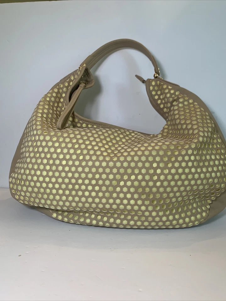 Charming Charlie Tan & Yellow Buttercup Perforated Hobo Handbag - Image 1 of 4