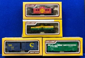 Konvolut 4 alte lebensechte Eisenbahnwagen der Spur HO mit Kartons, alle komplett - Bild 1 von 9