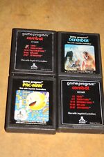 Lot of 4 Vintage ATARI Video Game Cartridges - PacMan- Defender - Combat CX-2601