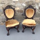 R. J. HORNER PAIR OF FIGURAL CARVED OAK DINING CHAIRS