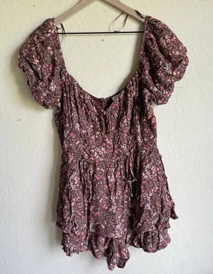 NWT Francesca’s M Romper Women’s Maroon Floral Print Lace Up Detail puff sleeve  - Image 1 of 4