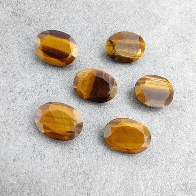 [WHOLESALE] NATURAL TIGER EYE FACETED OVAL SHAPE LOOSE GEMSTONE - Image 1 of 4