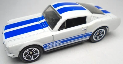 1998 MATCHBOX '65 FORD MUSTANG GT WHITE 1:66 DIECAST 2 3/4" CAR W/ BLUE STRIPES - Image 1 of 4