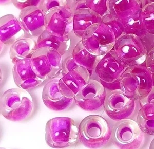 6/0 Cuentas de Semillas TOHO Japonesas Color Interior Cristal/Opaco Fuschia Forradas 10-Gramos - Imagen 1 de 2