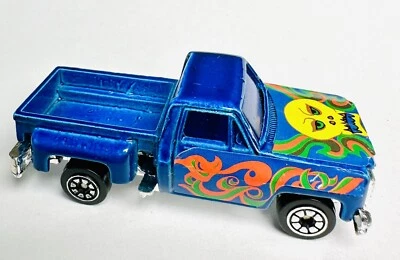 Camioneta Ford F-150 Super Wheels años 80 azul Yatming calavera escala 1/64 Foto 1 de 4