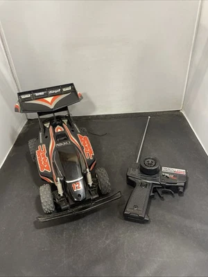 Nikko Turbo Tornado Buggy Bridgestone Negro y Rojo - Usado Foto 1 de 4