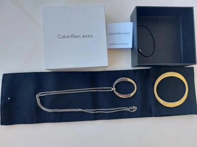 Juego de joyas de acero inoxidable Calvin Klein brillo. Pulsera y collar ovalados lisos Foto 1 de 4