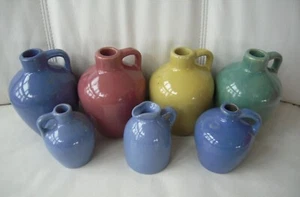 VINTAGE LOT 7 STONEWARE POTTERY JUGS - GREEN, BLUE, PINK, YELLOW- VERMONT MAPLE - Picture 1 of 9