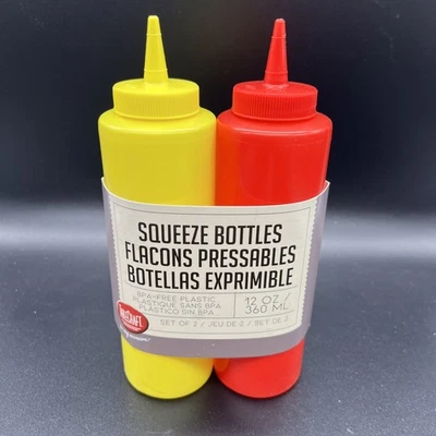 Tablecraft 112KM Red/Yellow Polyethylene Ketchup and Mustard Dispensers 12 oz ea - Image 1 of 2
