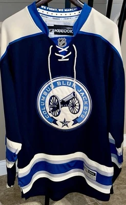 Hombre Reebok NHL Columbus Azul Chaquetas Azul/Blanco Cannon Jersey, Extra Grande XL Foto 1 de 4