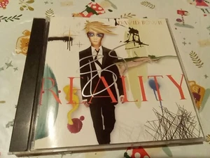 Original  Hand  Signed  Cd  Reality  By  David  Bowie  - Bild 1 von 4