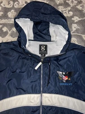 Chaqueta de lluvia reflectante cortavientos Lightwgt para hombre con capucha transpirable Alemania Foto 1 de 4