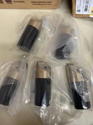 Gancho inclinado moderno Franklin B41615-BCZ-B 2-1/4" negro y bronce champán... Foto 1 de 2