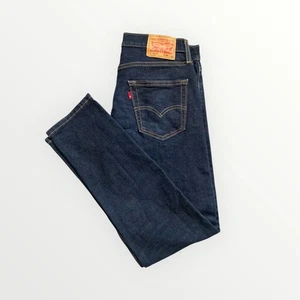Pantalones de mezclilla Levi’s 512 ajustados índigo para hombre W34 L30 rojo lengüeta en blanco - Imagen 1 de 10