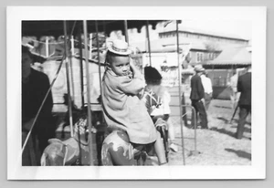 Photo African American Girl Looks Over Shoulder on Carousel Merry-Go-Round 1940s - Picture 1 of 3