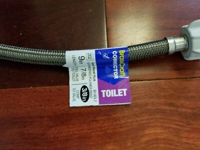 Conector de inodoro de agua trenzado flexible BrassCraft polímero de 9" 125 psi B1-9DL F Foto 1 de 3