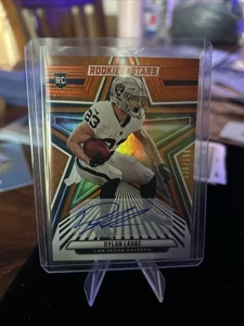 2024 Panini Rookies & Stars - Rookies Dylan Laube #130 Orange Signatures /199... - Imagen 1 de 2