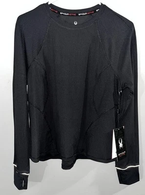 Top elástico Spyder Active para mujer manga larga cremallera bolsillo abertura en el pulgar grande $58 Foto 1 de 4