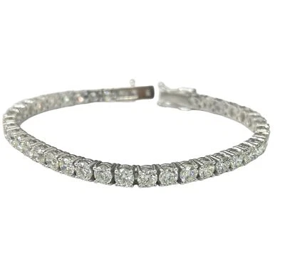 Brazalete tenis redondo de diamantes brillantes de oro blanco de 11,86 quilates Foto 1 de 4