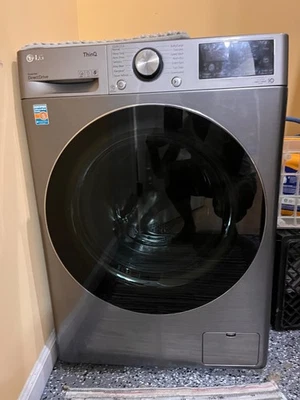 LG Smart Front Load Washer / Dryer Combo 24" - Image 1 of 4