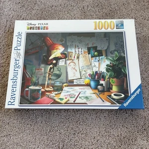Disney Pixar The Artist's Desk Ravensburger 1000 Piece Jigsaw Puzzle New Sealed - Picture 1 of 8